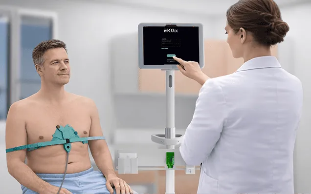 Clinician starting an exam on the EKGx tablet